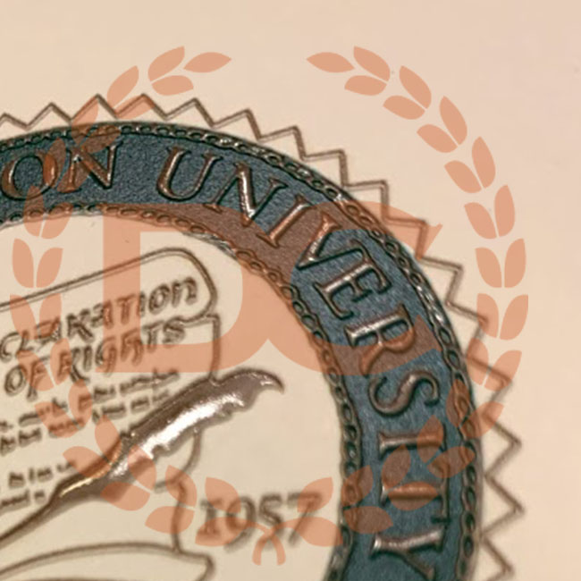 fully embossed gold and full seal on a fake George Mason university diploma