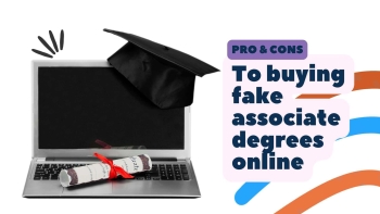 rolled up diploma with ribbon laying down on a laptop with graduate cap