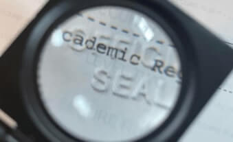 official labelled registrar stamp on fake transcript print