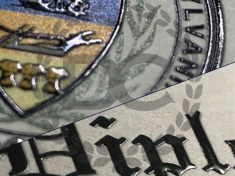 Up close of fake diploma with embossed seals and raise text! Best quality anywhere! 100% Satisfaction Guaranteed! upclose view of fake diplomas showing text and seals embossed