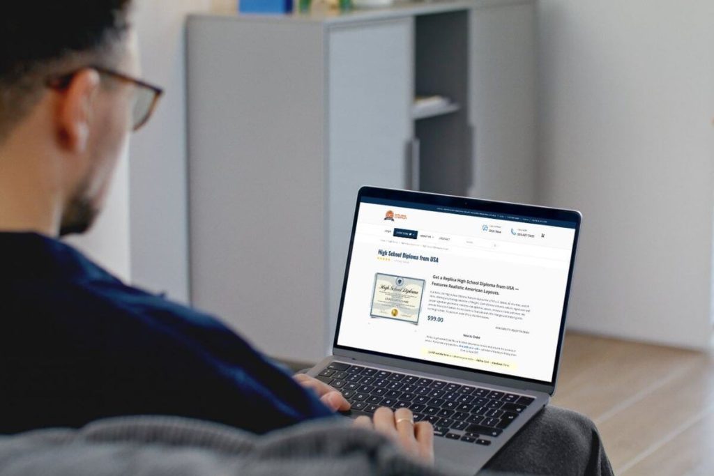 Customer placing an online order for a custom diploma using his laptop
