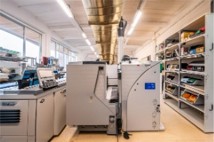Professional large format printing equipment at Diploma Company production facility