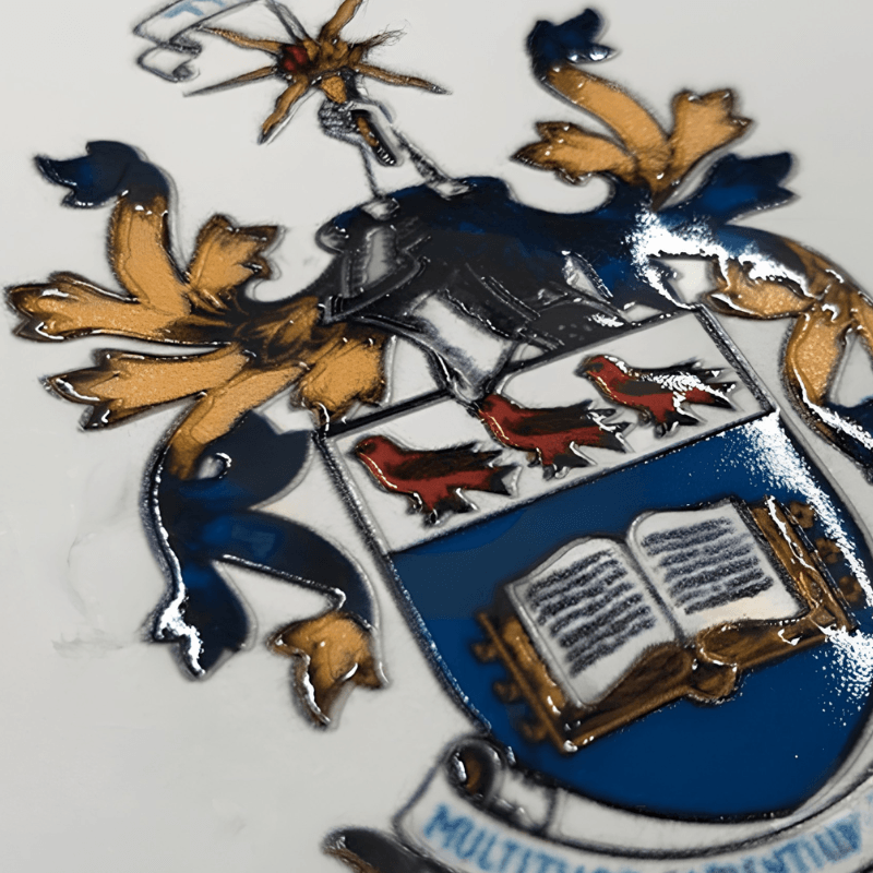 Foil crest embossing on a replica college diploma