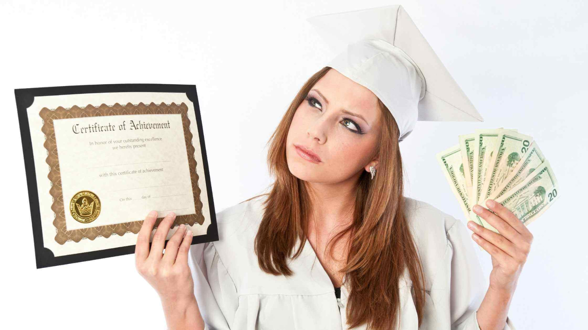 Saving Money on Fake Degrees: A Visual Guide Redheaded graduate in cap and gown holding a degree and cash, showcasing the cost of fake degrees