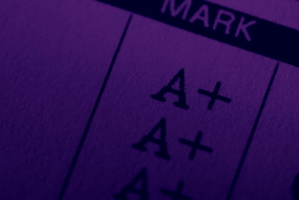 Close-up of transcript with A+ grades, illustrating the ordering process result
