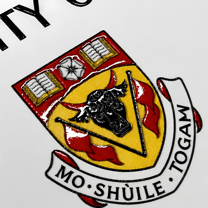 Color crest seal on a replica diploma